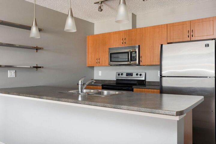 Property Photo:  136C Sandpiper Road 606  AB T9K 0J7 