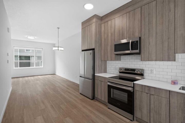Property Photo:  101 Panatella Square NW 202  AB T3K 2R9 