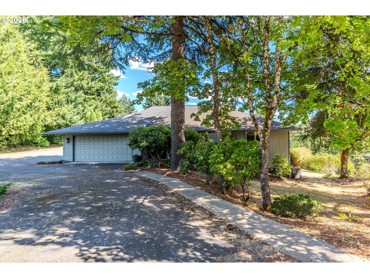 Property Photo:  10900 SE 258th Pl  OR 97089 