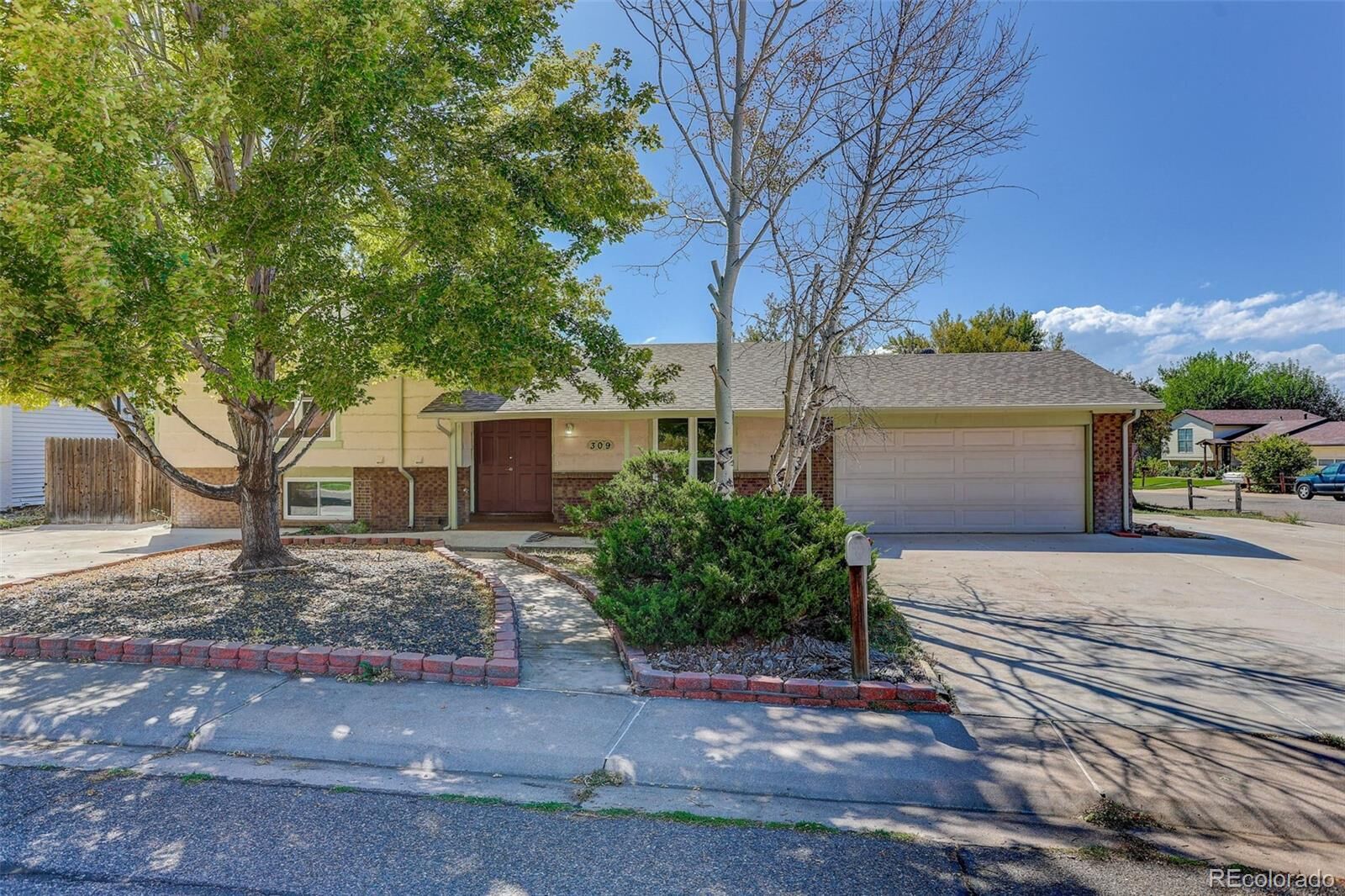 Property Photo:  309 S 25th Avenue  CO 80601 