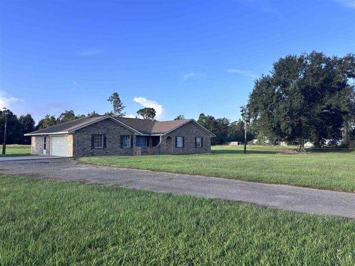 Property Photo: 3233 Cypress Lake Drive LA 70611