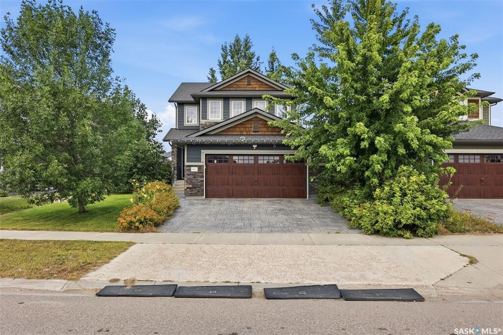 Property Photo:  411 Hartley Road  SK S7T 0E7 