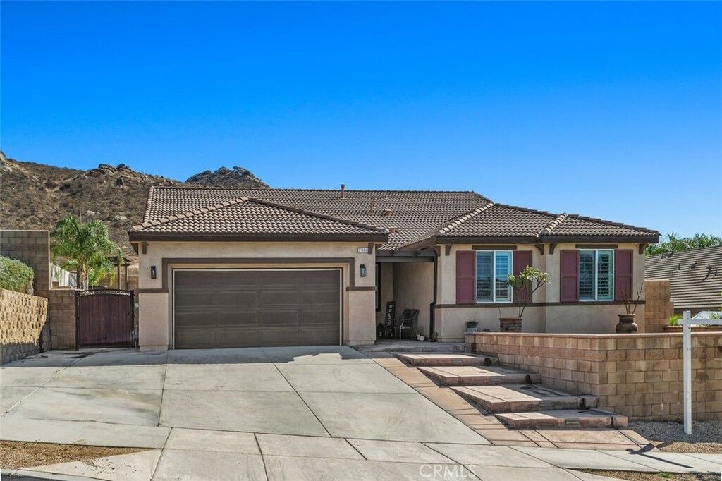 Property Photo:  7066 Almandine  CA 92509 