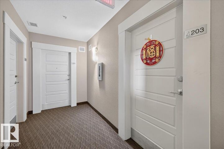 Property Photo:  6084 Stanton Drive SW 203  AB T6X 0Z4 