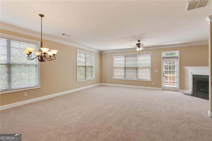 Property Photo:  5060 Windcrest Lane  GA 30022 