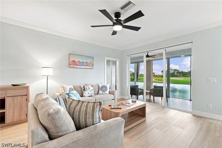 Property Photo: 5877 Three Iron Drive 702 FL 34110