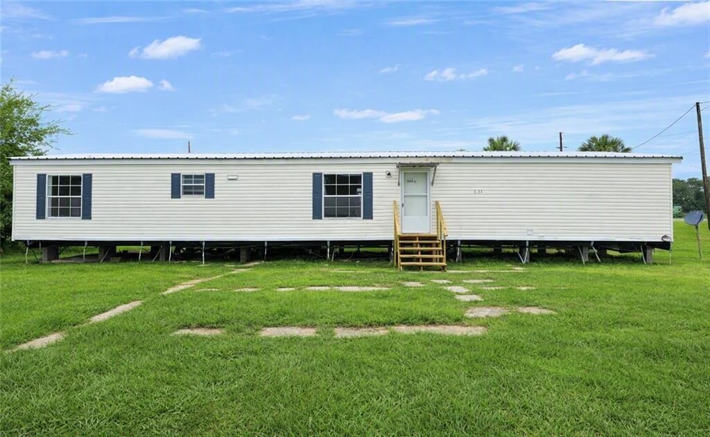 Property Photo:  35930 Highway 11  LA 70041 