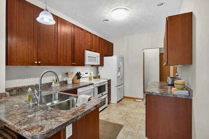 Property Photo: 8600 Tessman Circle N MN 55445