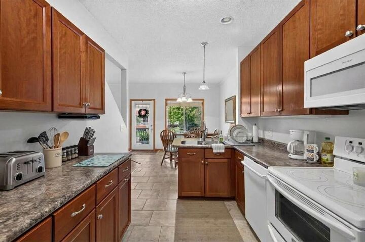 Property Photo:  8600 Tessman Circle N  MN 55445 