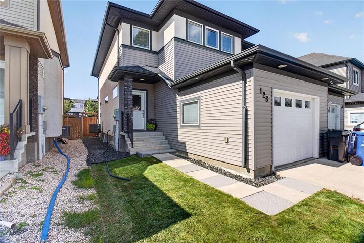 Property Photo:  128 Larry Vickar Drive  MB R3W 0K4 
