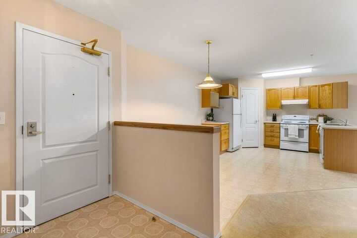 Property Photo:  13441 127 Street NW 157  AB T5L 5B6 