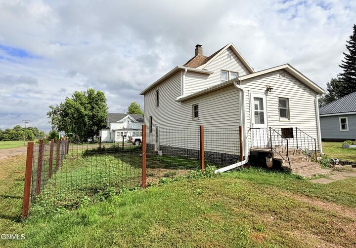 Property Photo: 223/227 Helen Street S ND 58483