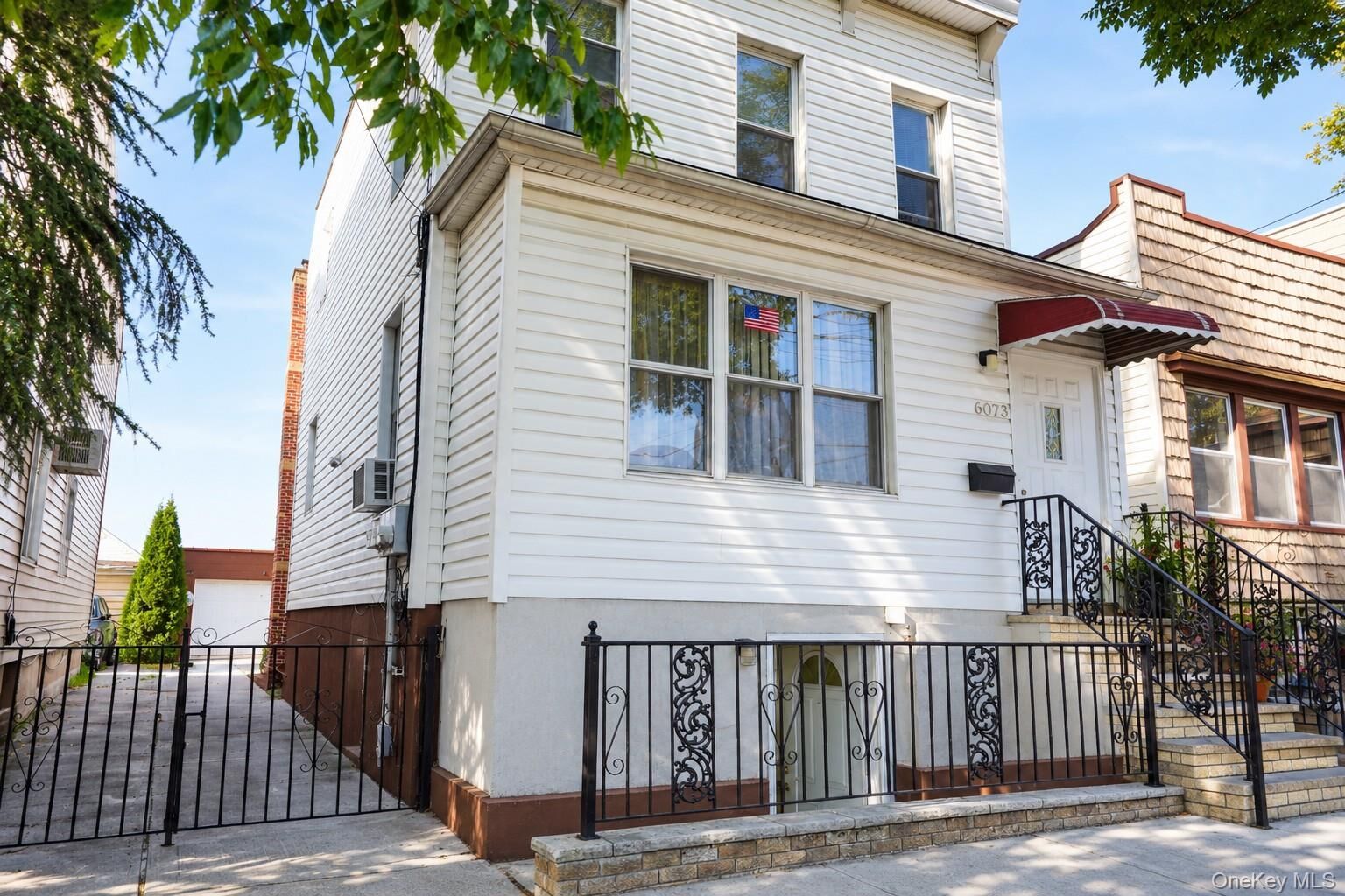 Property Photo:  6075 59th Avenue  NY 11378 