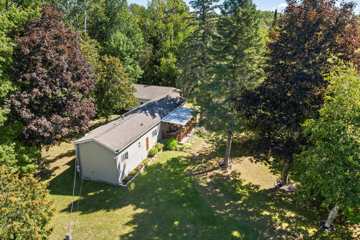 Property Photo:  10262 Burgess Road  MI 49720 