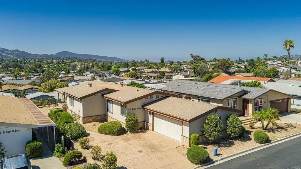 Property Photo:  1711 Kiwi  CA 92026 