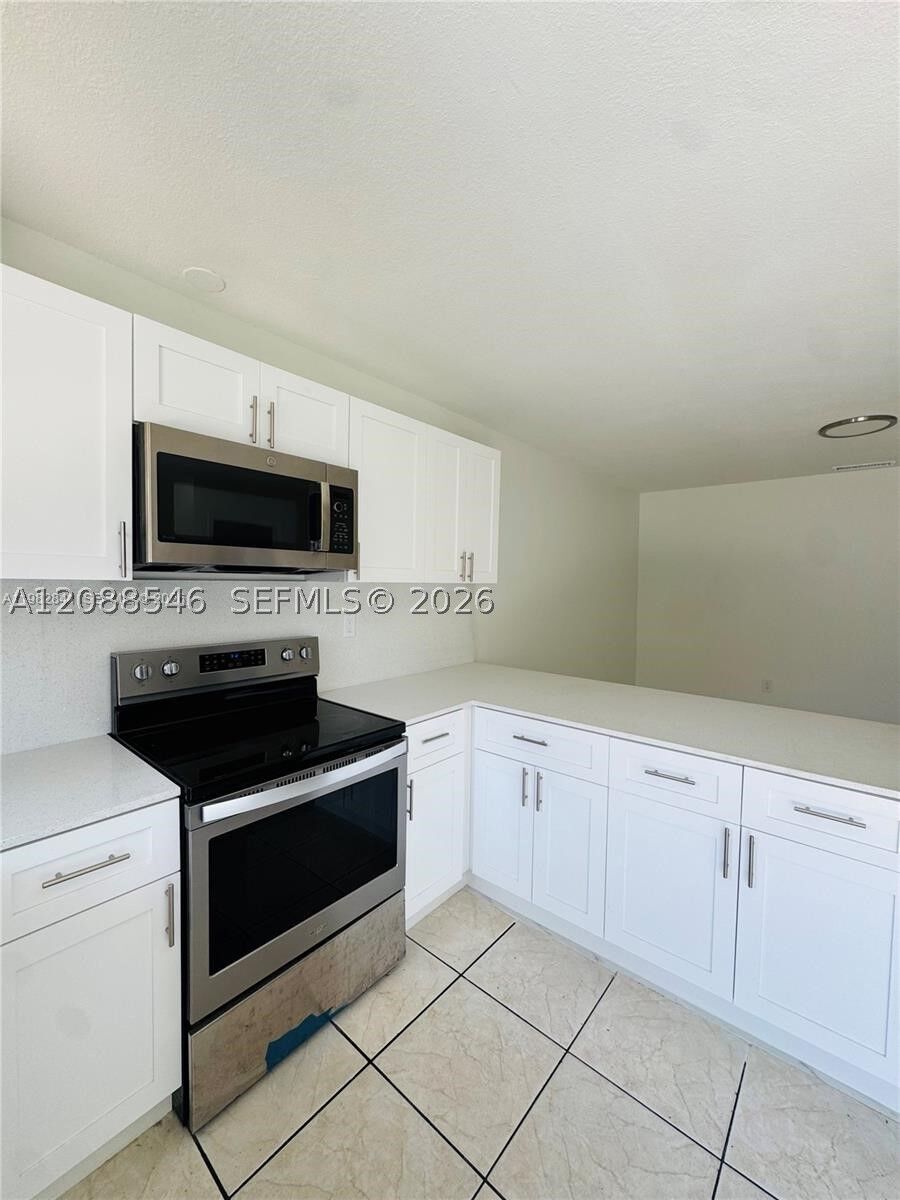 Property Photo:  1107 NW 30th Ave 1107  FL 33125 