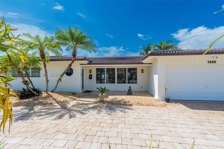 Property Photo:  1440 SE 14th Dr  FL 33441 