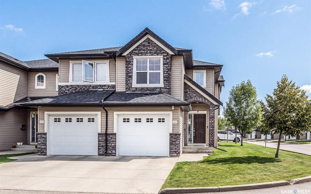 Property Photo:  410 Ledingham Way 211  SK S7V 0C4 