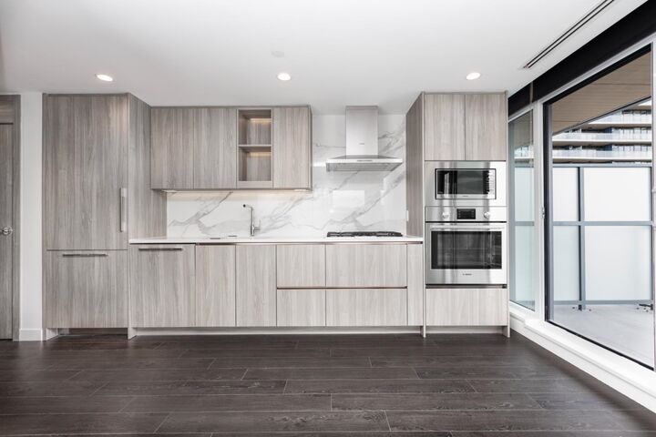 Property Photo:  4890 Lougheed Highway 3207  BC V5C 0N1 