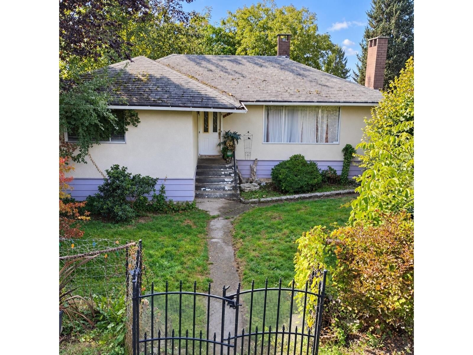 Property Photo:  10369 125 Street  BC V3V 4Y6 