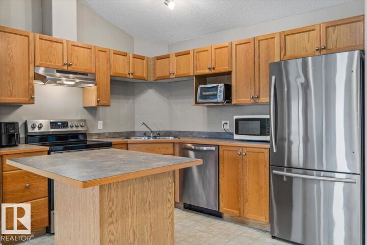 Property Photo: #402 5340 199 St NW AB T6M 0A5