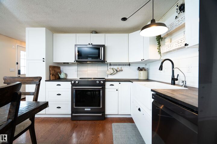 Property Photo: 1215 Lake Vista Crescent AB T8H 1K4