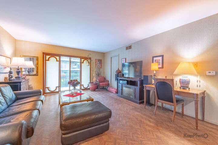 Property Photo:  4949 Golf Road 105  IL 60077 
