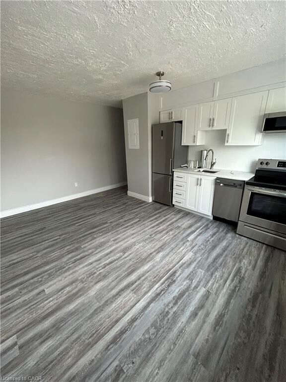 Property Photo:  385 Melvin Avenue 205  ON L8H 2K6 