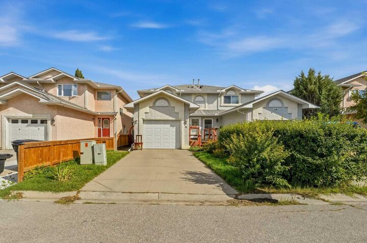 Property Photo:  28 Martinglen Way NE  AB T3J 3H9 