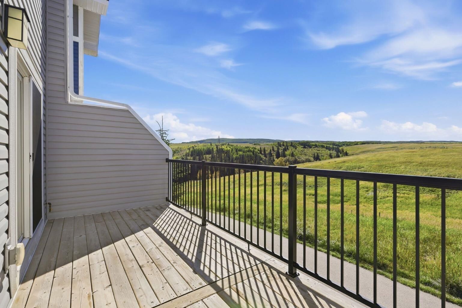 Property Photo:  1602 Jumping Pound Common  AB T4C 2L1 