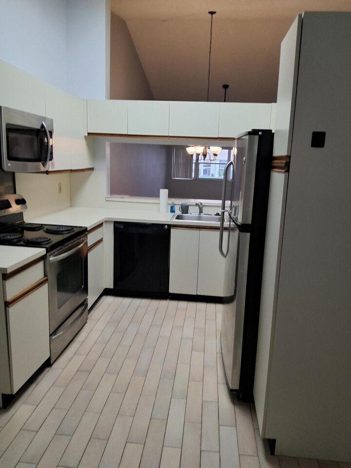 Property Photo:  4693 E Lucerne Lakes Boulevard E 202  FL 33467 