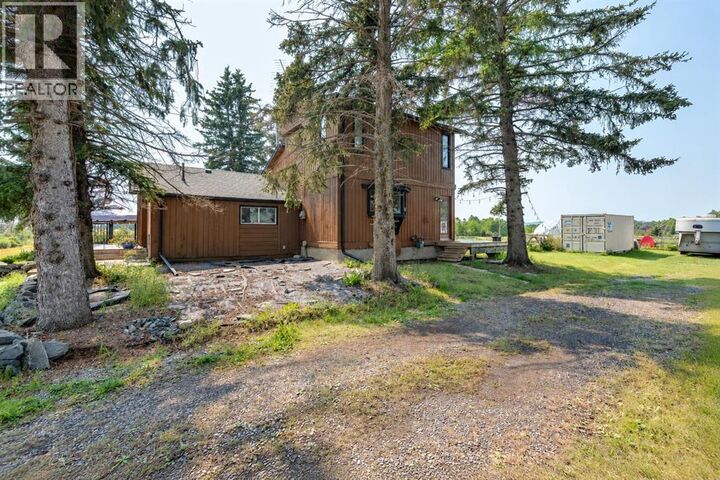 Property Photo: 242005 209 Street West AB T1S 2Y5