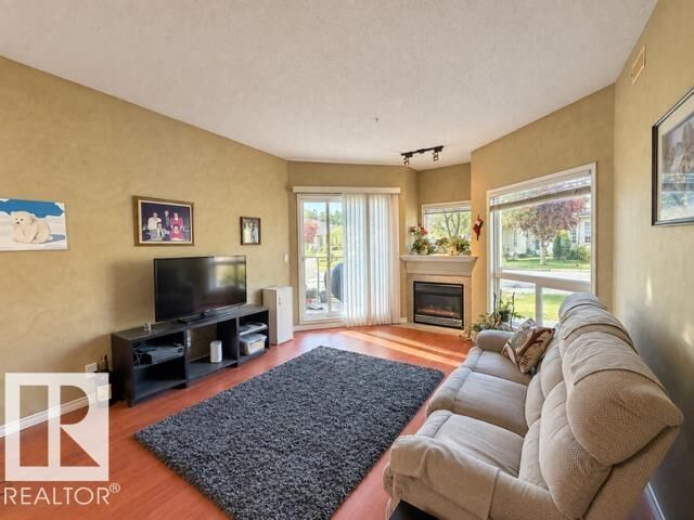 Property Photo:  102A Bridgeport Crossing 102  AB T9E 8K8 