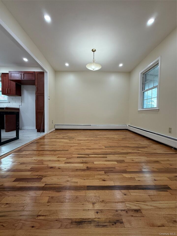 Property Photo:  164 84 Ave  NY 11432 