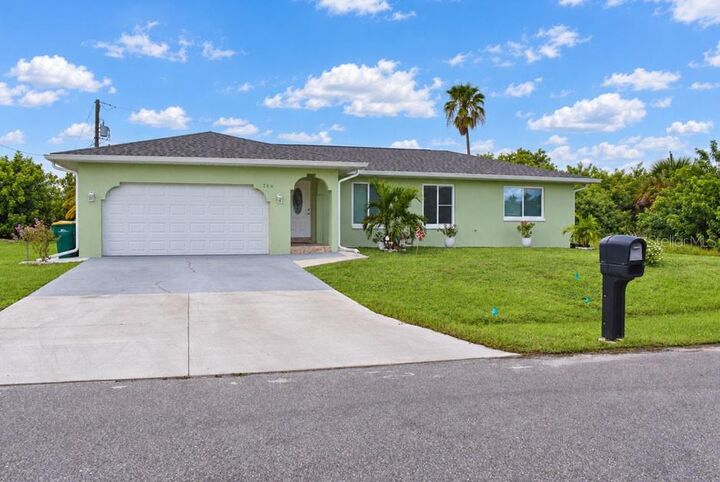 Property Photo: 266 Warwick Street NW FL 33952