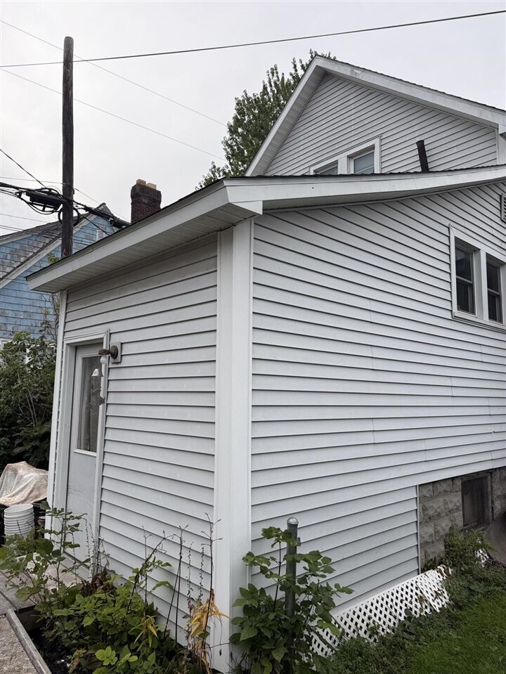 Property Photo:  210 S 7th Avenue  MI 49707-2524 