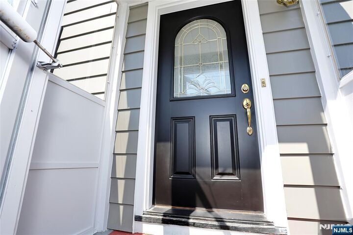 Property Photo:  28-19 Warren Road  NJ 07410 