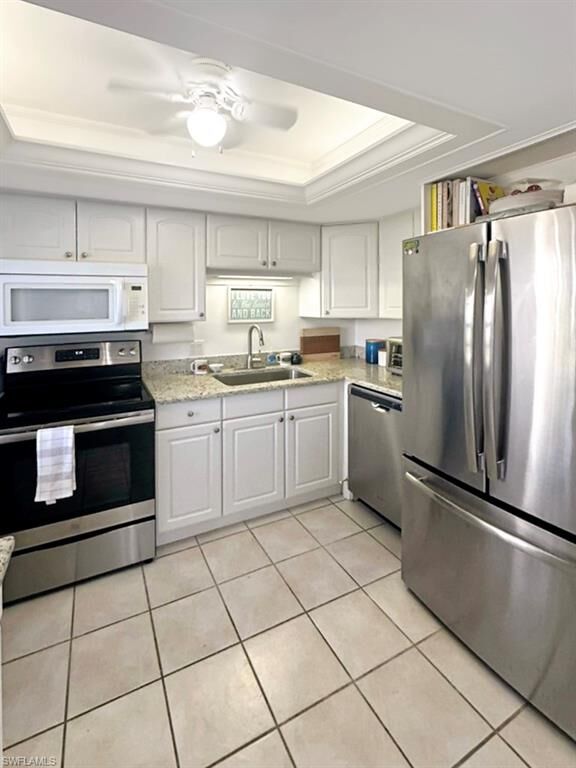 Property Photo:  1130 Swallow Ave B107  FL 34145 