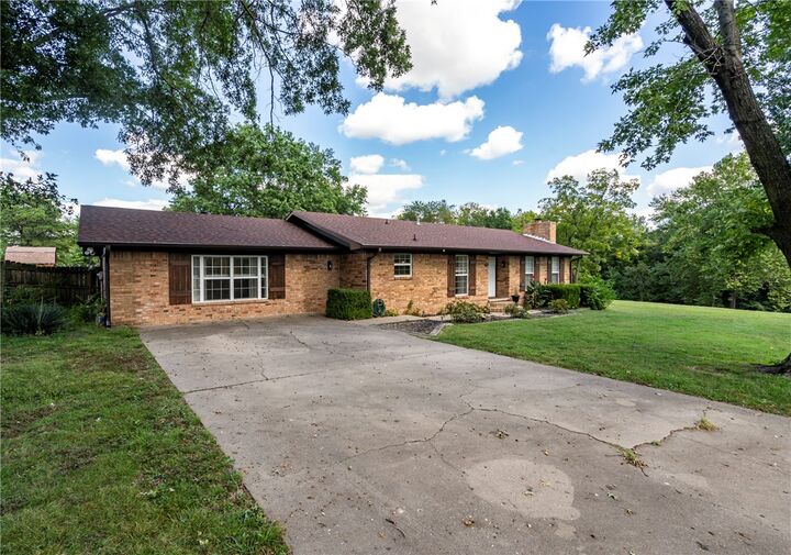 Property Photo:  203 W Raines Road  AR 72761 