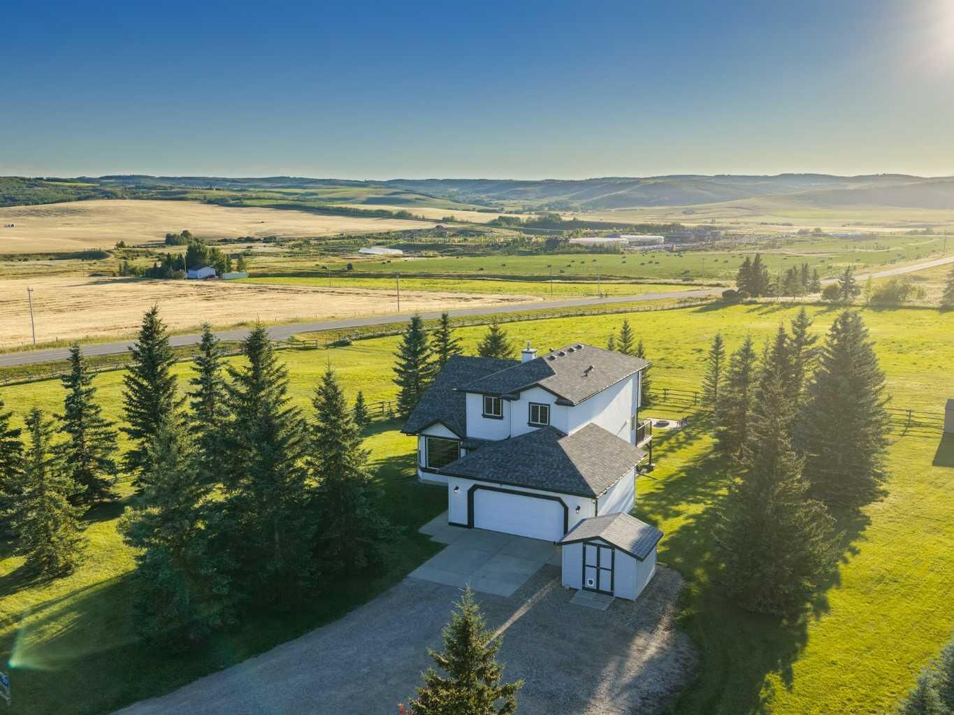 Property Photo: 210243 102 Street W AB T1S 0V4