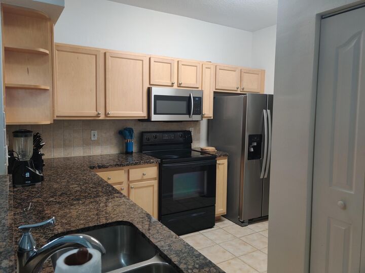 Property Photo:  224 E Murcia Drive 201  FL 33458 