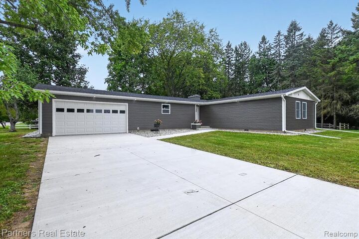 Property Photo: 204 Greenfield Drive MI 48858