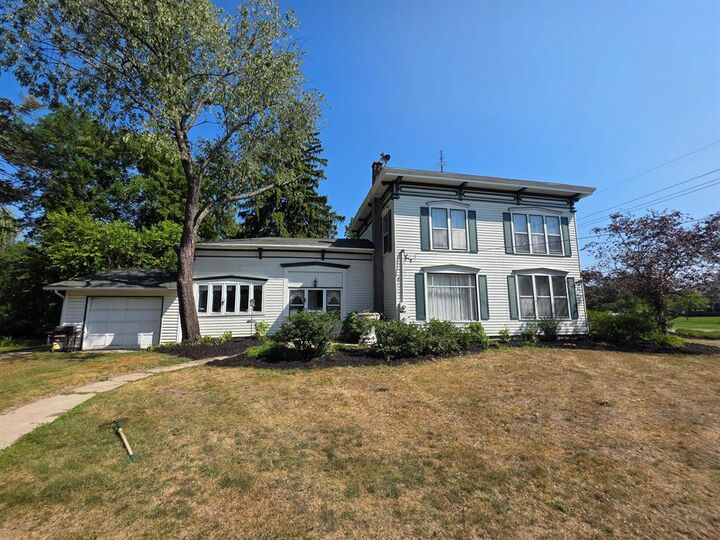 Property Photo: 427 S Main Street NE MI 49319