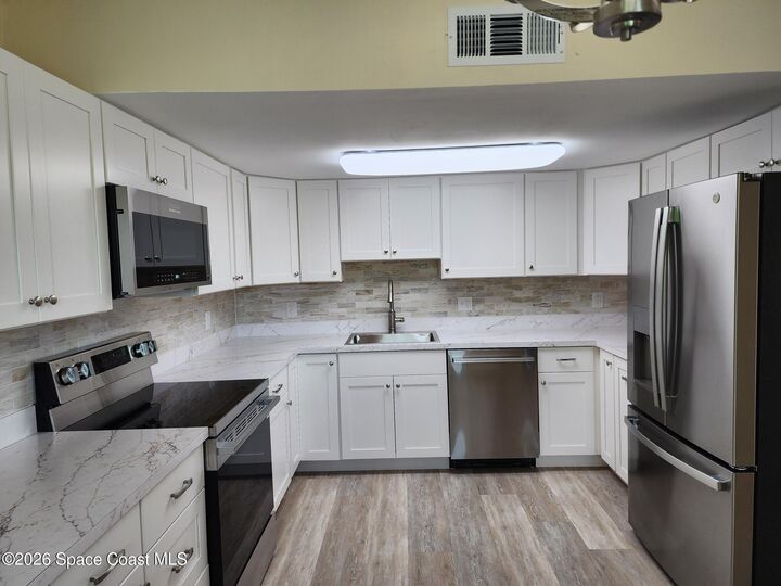 Property Photo:  5801 N Atlantic Avenue  FL 32920 