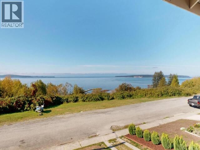 Property Photo:  5374 Larch Ave  BC V8A 4M5 