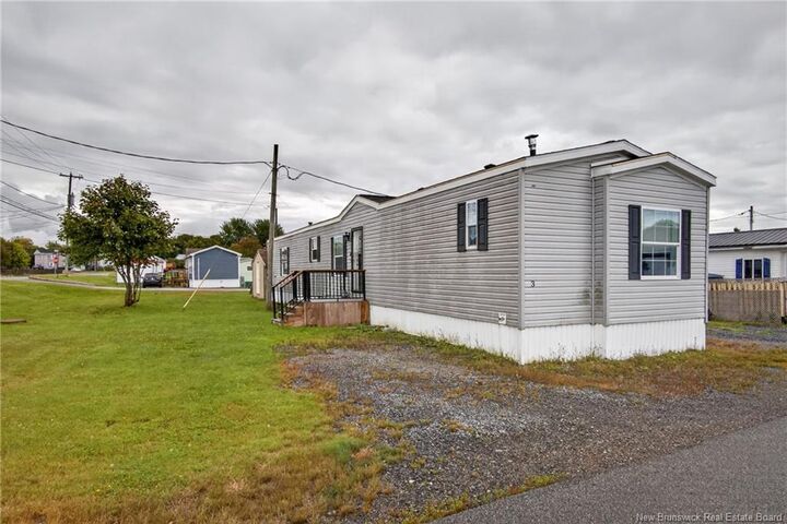Property Photo:  3 Daisy Street  NB E2M 5M9 