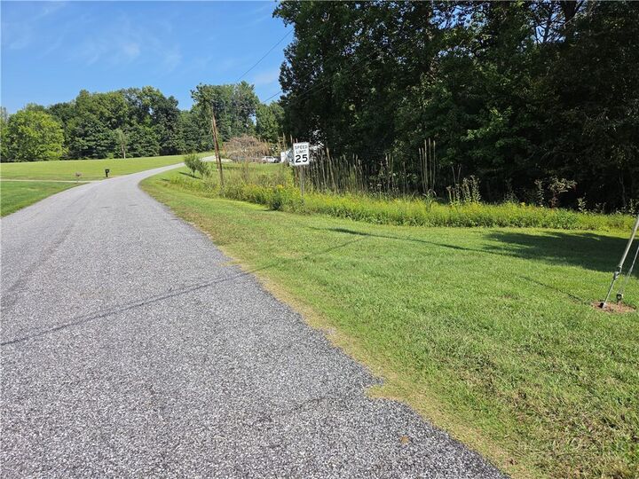 Property Photo:  Tbd Belle Ridge Street  NC 28659 