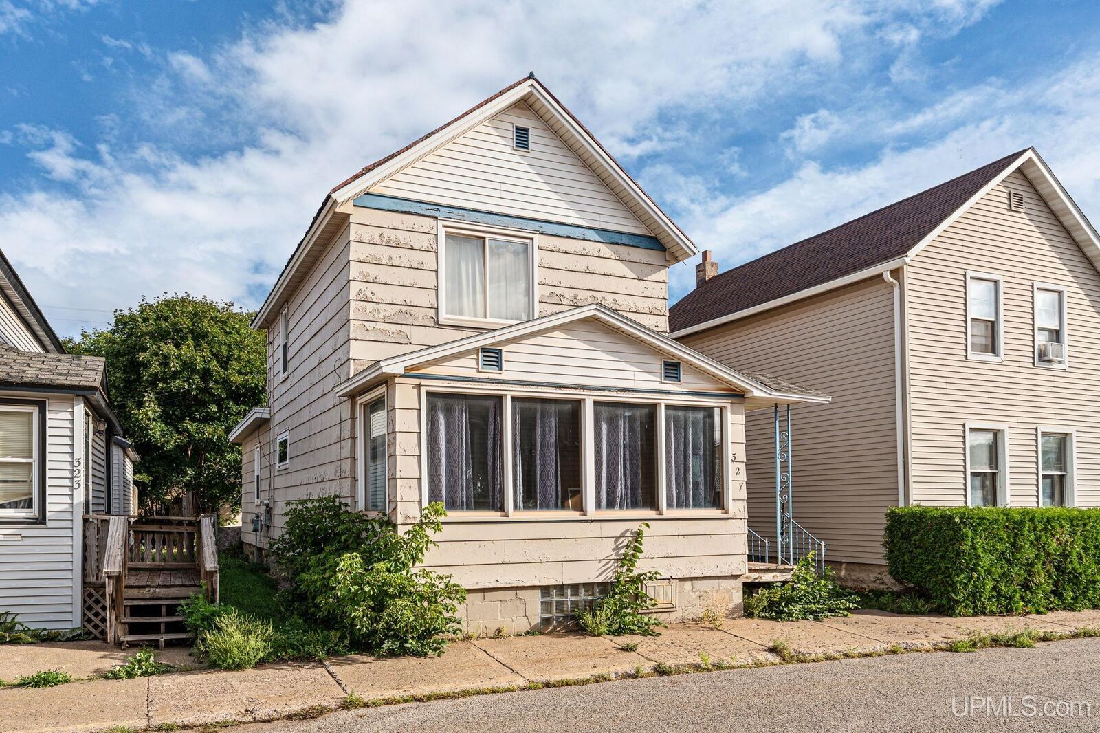 Property Photo:  327 Bank Street  MI 49849 