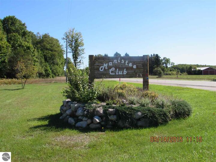 Property Photo:  100 Eric Drive  MI 49646 