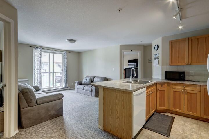 Photo de la propriété: 186 Kananaskis Way 202 AB T1W 0A2